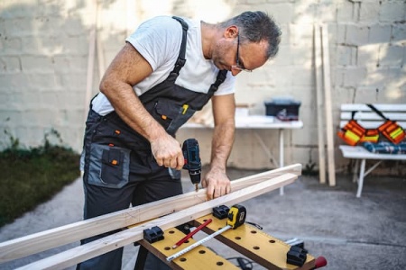 mature-male-carpenter-using-electric-drill-on-a-wo-2025-06-22-06-51-08-utc (1).jpg